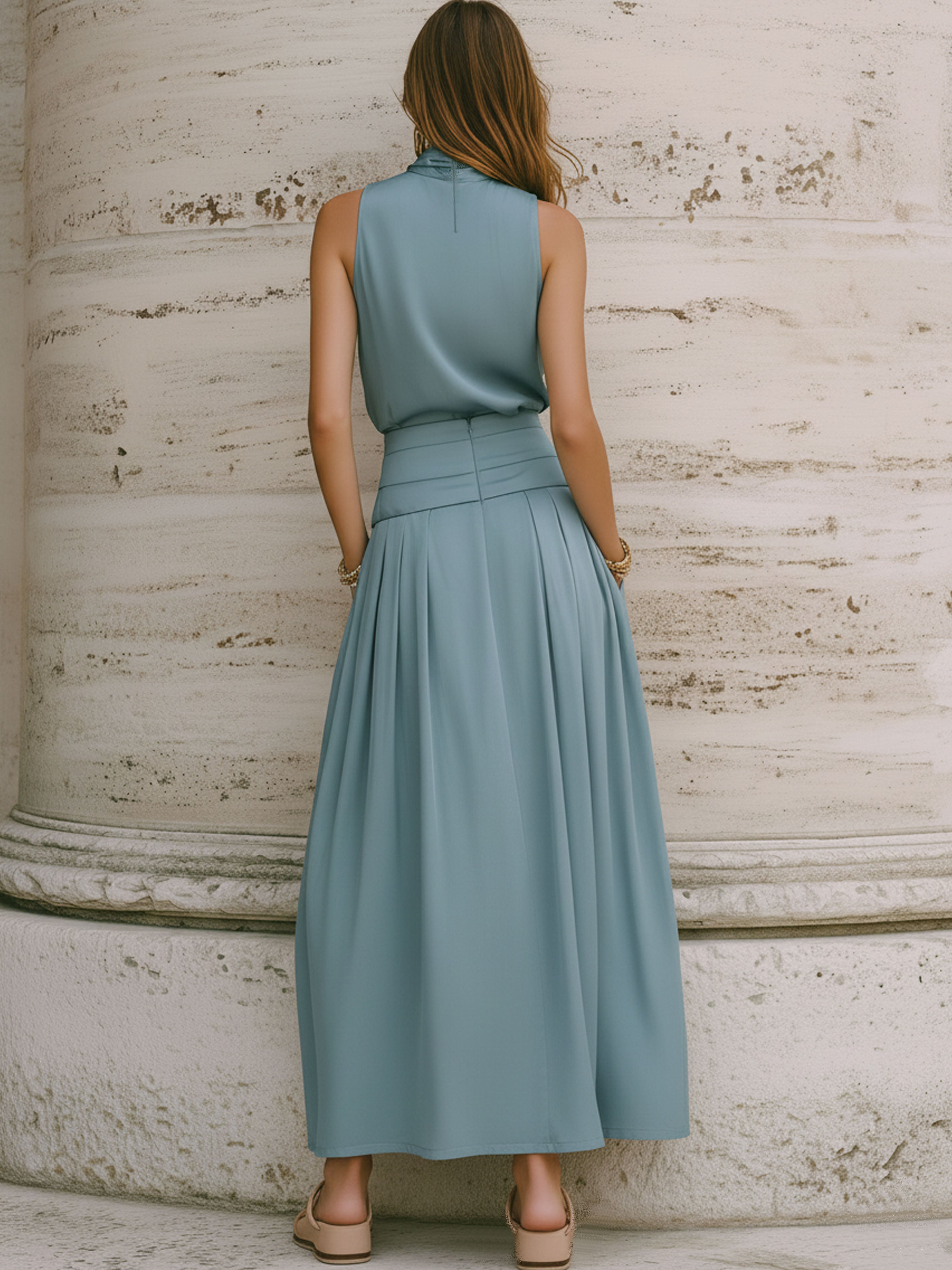 Resort-Style High-Neck Blue-Green Sleeveless Top And Long Skirt Set