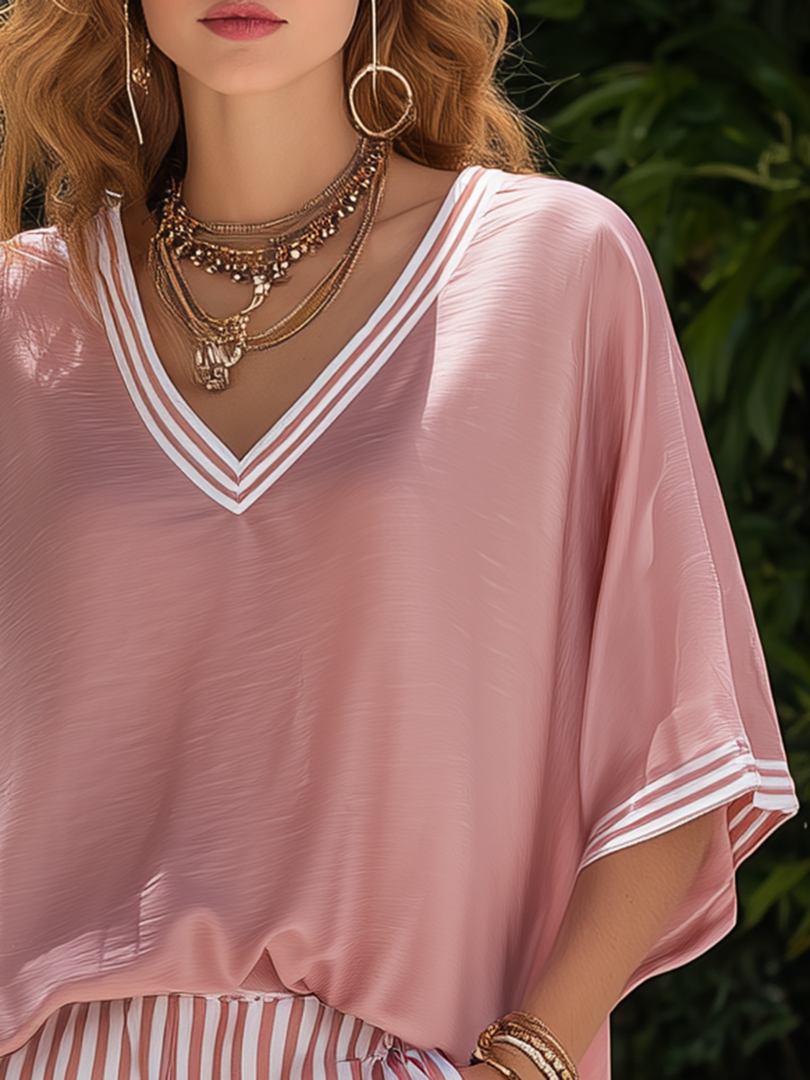 A Stylish Vacation-Style Pink Short-Sleeve And Striped Shorts Set